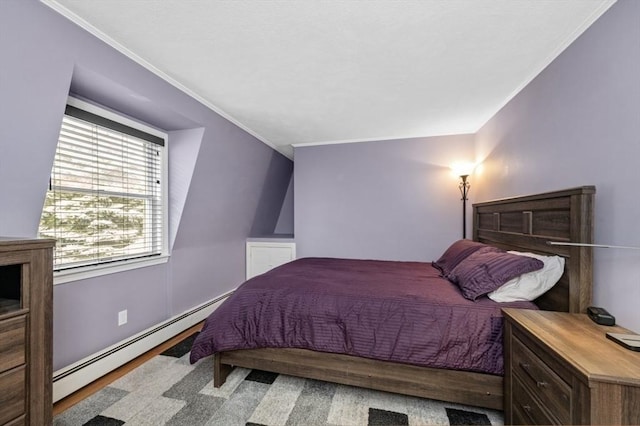 35 Crest Rd, Lynnfield, MA 01940 - bedroom with baseboard heating, crown molding, and wood finished floors