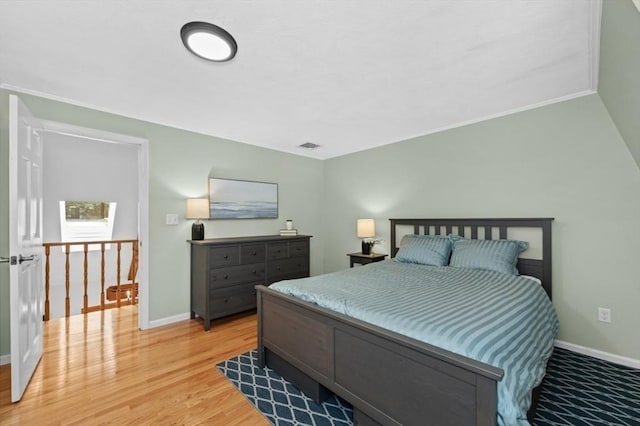 35 Crest Rd, Lynnfield, MA 01940 - bedroom with light wood-style floors and crown molding
