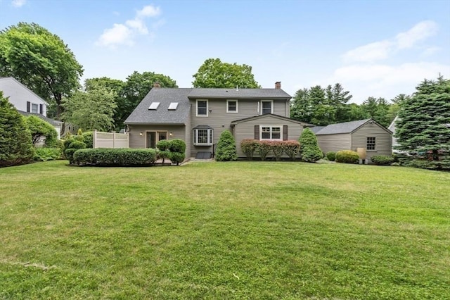 35 Crest Rd, Lynnfield, MA 01940 - view of front of home featuring a chimney and a front yard