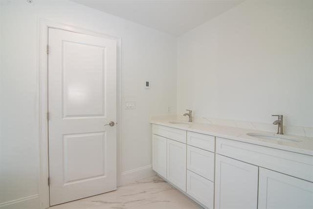 6 Carmel Rd, Pelham, NH 03076 - full bath featuring marble finish flooring, baseboards, and double vanity