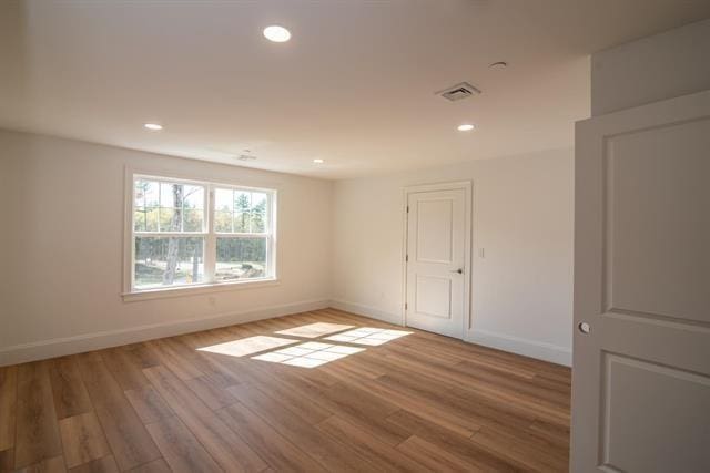 6 Carmel Rd, Pelham, NH 03076 - spare room featuring baseboards, wood finished floors, and recessed lighting