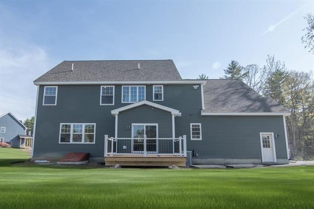 6 Carmel Rd, Pelham, NH 03076 - back of house with a wooden deck and a yard