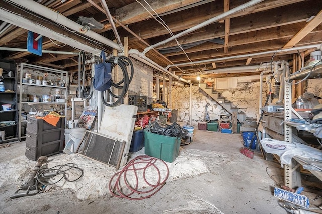 145 Lexington Rd, Billerica, MA 01821 - unfinished below grade area featuring stairway
