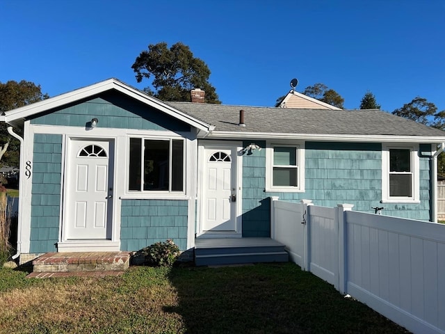 view of front of home with a front yard