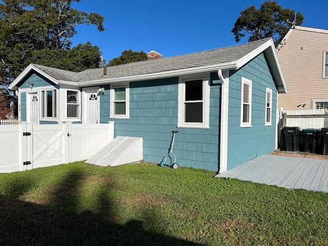 exterior space featuring a lawn