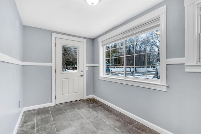 doorway with baseboards