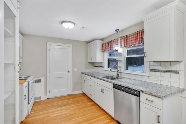 kitchen featuring decorative backsplash, white cabinetry, dishwasher, and a sink