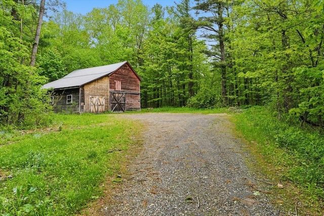 19 Buffington Hill Rd, Worthington, MA 01098 - view of road featuring a barn and a wooded view