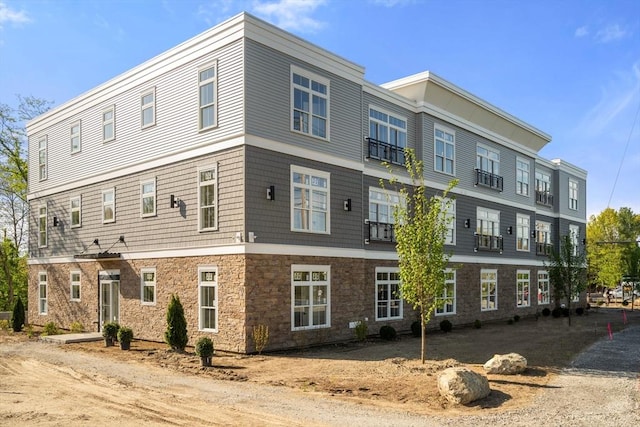 view of front of home featuring stone siding
