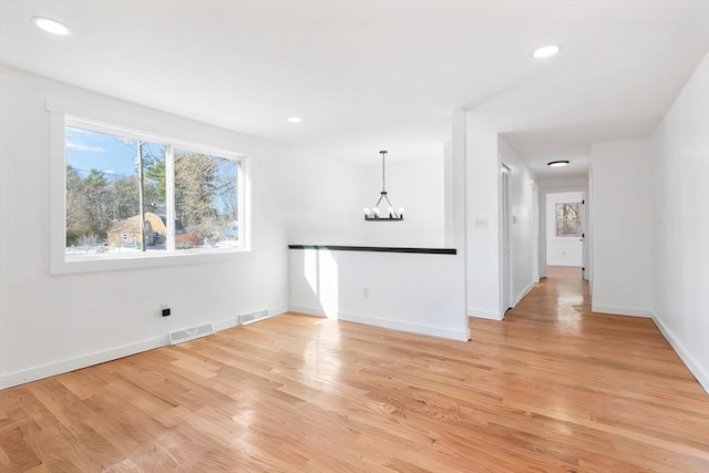 11 Adams St, Foxboro, MA 02035 - interior space featuring baseboards, a notable chandelier, light wood-style flooring, and visible vents