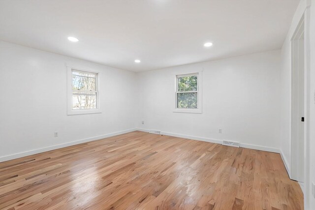 11 Adams St, Foxboro, MA 02035 - empty room with recessed lighting, baseboards, visible vents, and light wood-style floors