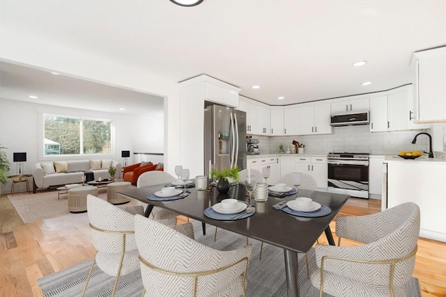 11 Adams St, Foxboro, MA 02035 - dining room featuring light wood-type flooring and recessed lighting