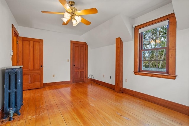 301 Old Billerica Rd, Bedford, MA 01730 - additional living space with baseboards, light wood-style flooring, vaulted ceiling, and ceiling fan