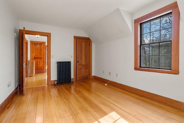 301 Old Billerica Rd, Bedford, MA 01730 - bonus room with radiator heating unit, light wood finished floors, baseboards, and lofted ceiling