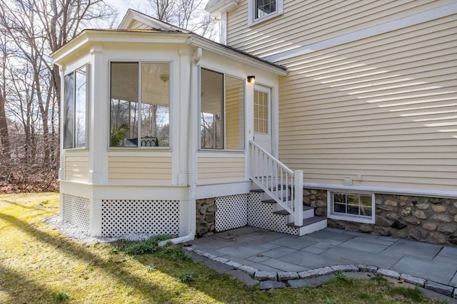 301 Old Billerica Rd, Bedford, MA 01730 - property entrance with a patio area and stone siding