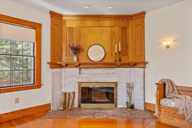 301 Old Billerica Rd, Bedford, MA 01730 - detailed view of wood finished floors, baseboards, a fireplace, and recessed lighting