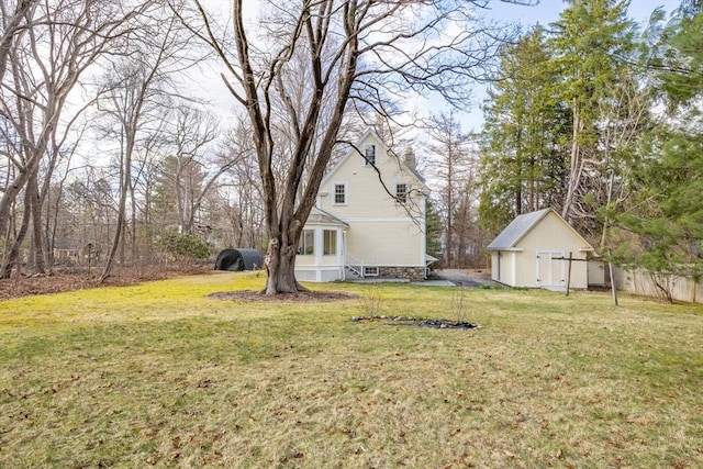 301 Old Billerica Rd, Bedford, MA 01730 - view of green lawn featuring a storage unit and an outdoor structure