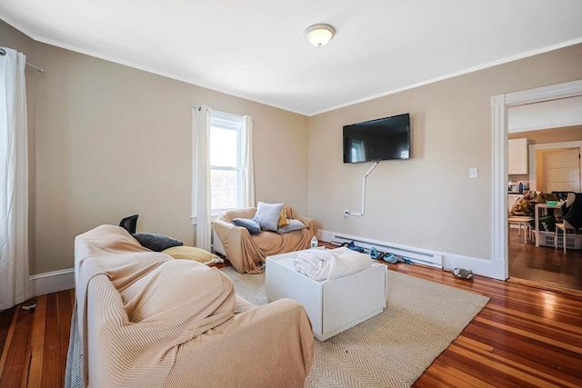 living room with a baseboard radiator and hardwood / wood-style flooring