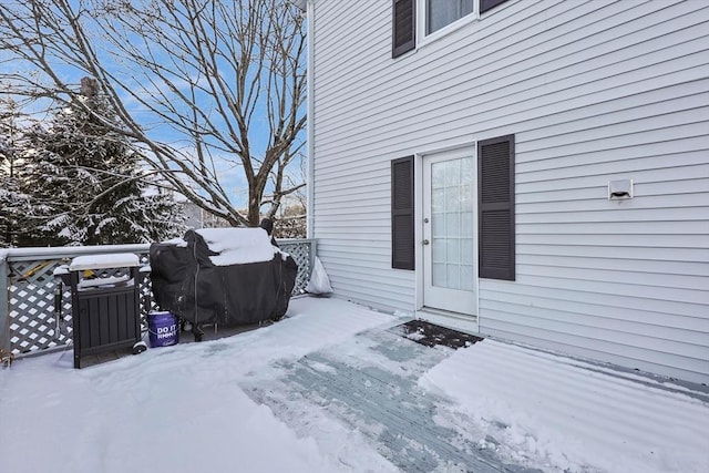 view of snow covered deck