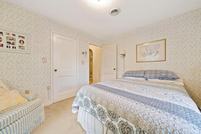 19 Oakdale Rd, Canton, MA 02021 - bedroom featuring wallpapered walls, arched walkways, and light carpet