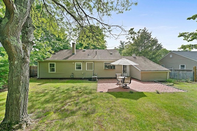 19 Oakdale Rd, Canton, MA 02021 - rear view of property with a patio area, a chimney, and central AC