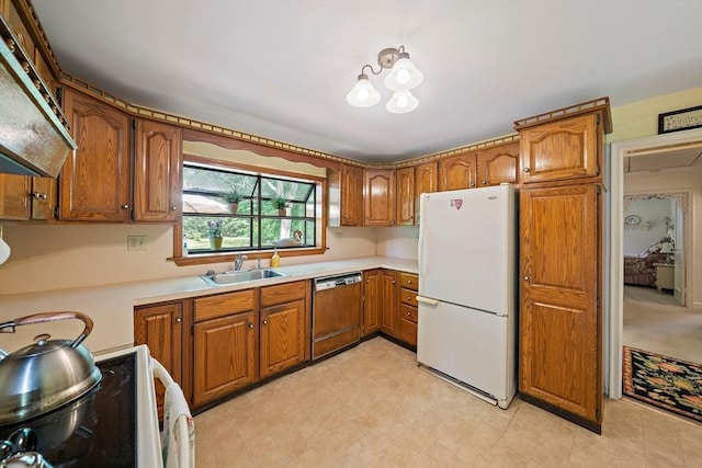 19 Oakdale Rd, Canton, MA 02021 - kitchen featuring white appliances, a sink, brown cabinetry, and light countertops