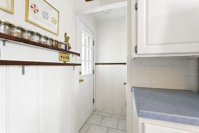 washroom with light tile patterned floors