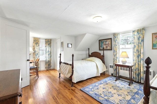 bedroom with wood-type flooring
