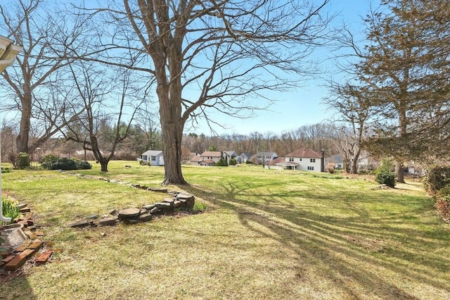 view of yard with a residential view