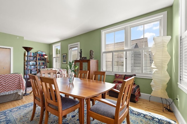 43 Park St Unit 15, Somerville, MA 02143 - dining area with wood finished floors, healthy amount of natural light, and baseboards