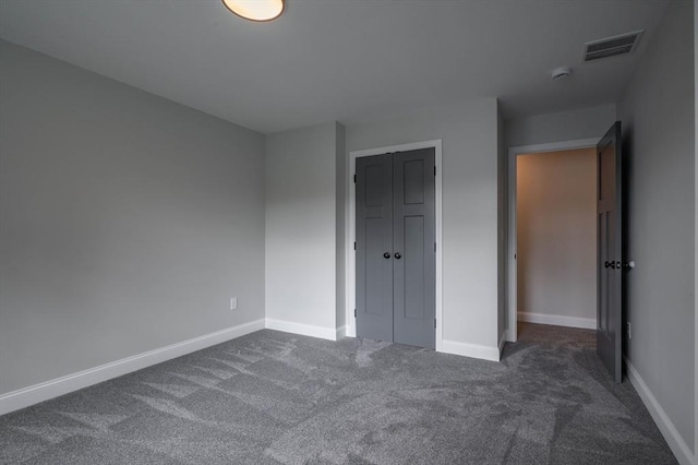 72 N Mast St Unit 1, Goffstown, NH 03045 - unfurnished bedroom featuring carpet and a closet