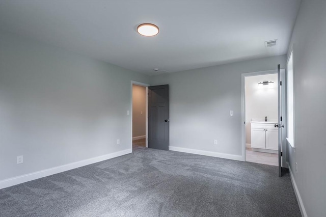 72 N Mast St Unit 1, Goffstown, NH 03045 - carpeted spare room with baseboards