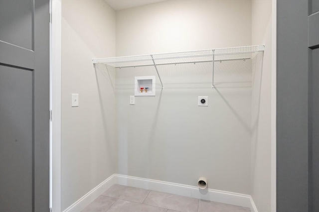 72 N Mast St Unit 1, Goffstown, NH 03045 - laundry area with hookup for a washing machine, hookup for an electric dryer, and light tile patterned floors