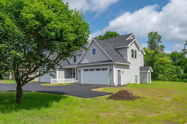 72 N Mast St Unit 1, Goffstown, NH 03045 - traditional home with driveway, roof with shingles, a front lawn, and a garage