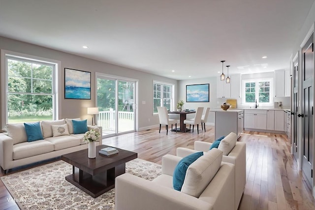 72 N Mast St Unit 1, Goffstown, NH 03045 - living room featuring light wood-style flooring and recessed lighting