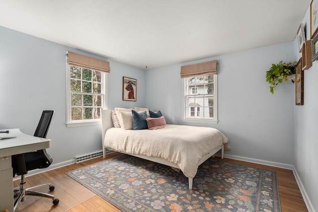 bedroom featuring light hardwood / wood-style floors