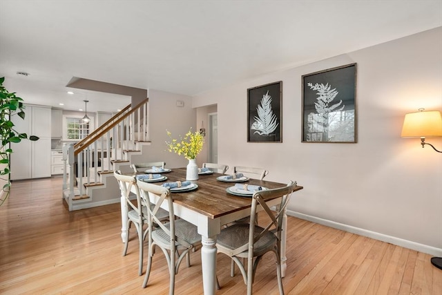 dining room featuring light hardwood / wood-style flooring