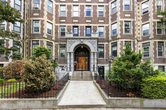 390 Riverway Unit 24, Boston, MA 02115 - view of exterior entry featuring brick siding