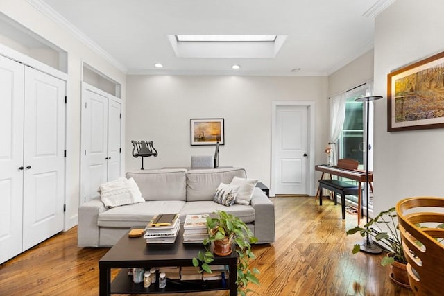 390 Riverway Unit 24, Boston, MA 02115 - living area featuring light wood-style flooring, a skylight, ornamental molding, and recessed lighting