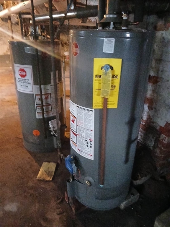 utility room featuring gas water heater