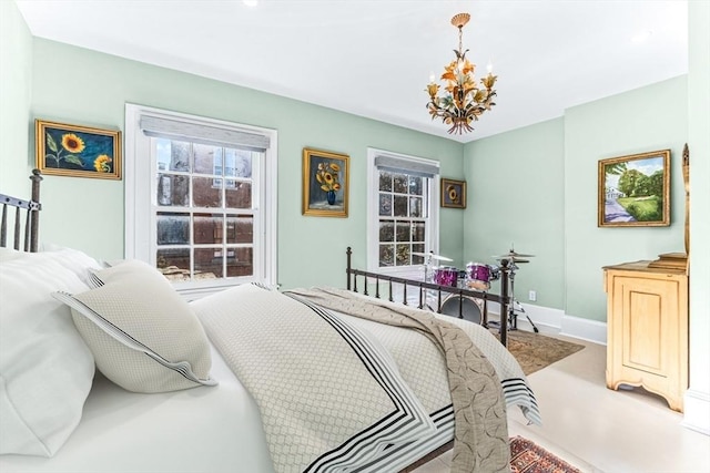 bedroom with an inviting chandelier