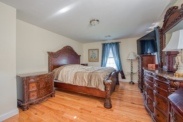 bedroom featuring light wood-type flooring