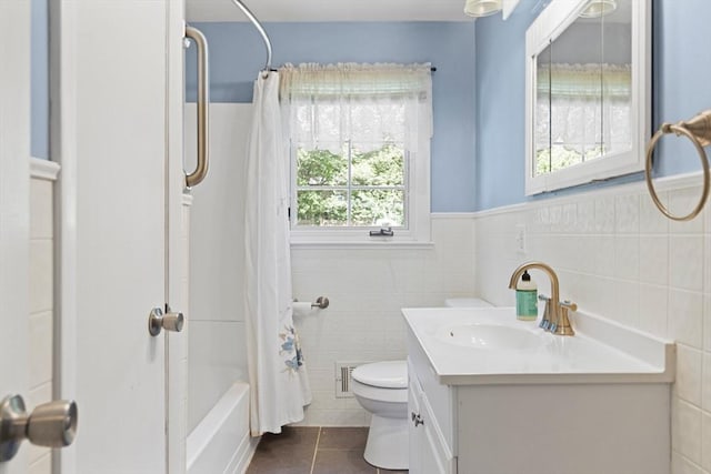 156 Patterson St, Attleboro, MA 02703 - bathroom with tile patterned floors, toilet, tile walls, vanity, and shower / bath combo
