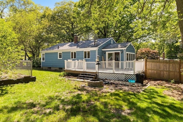 156 Patterson St, Attleboro, MA 02703 - back of property with a wooden deck and a chimney