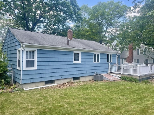 156 Patterson St, Attleboro, MA 02703 - back of property featuring a wooden deck, cooling unit, a yard, and a chimney
