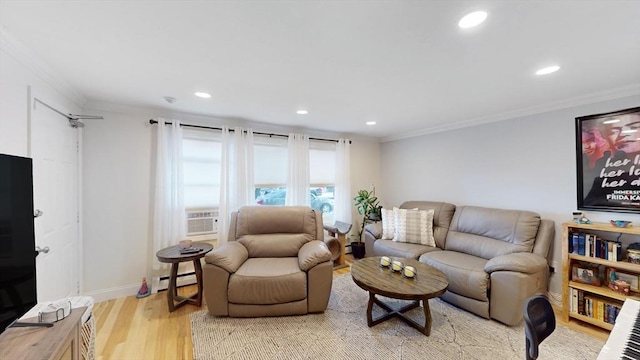 living room featuring light wood-style floors, baseboard heating, and crown molding