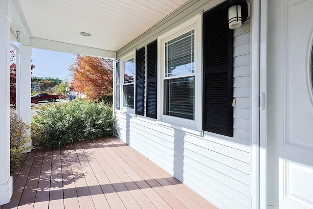 wooden deck with a porch