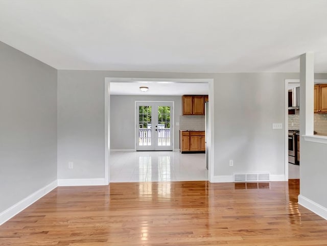 4 Gary Rd, Norton, MA 02766 - spare room featuring light wood-type flooring and french doors