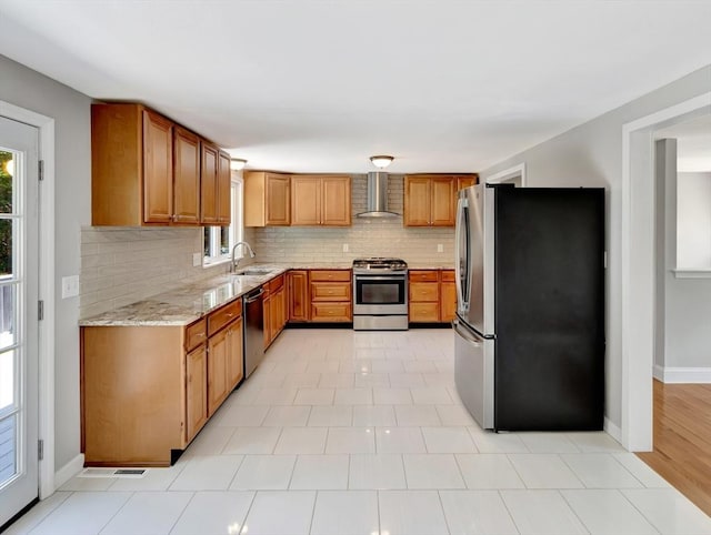 4 Gary Rd, Norton, MA 02766 - kitchen featuring appliances with stainless steel finishes, wall chimney range hood, plenty of natural light, and tasteful backsplash
