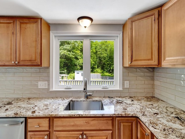 4 Gary Rd, Norton, MA 02766 - kitchen featuring stainless steel dishwasher, tasteful backsplash, and light stone countertops